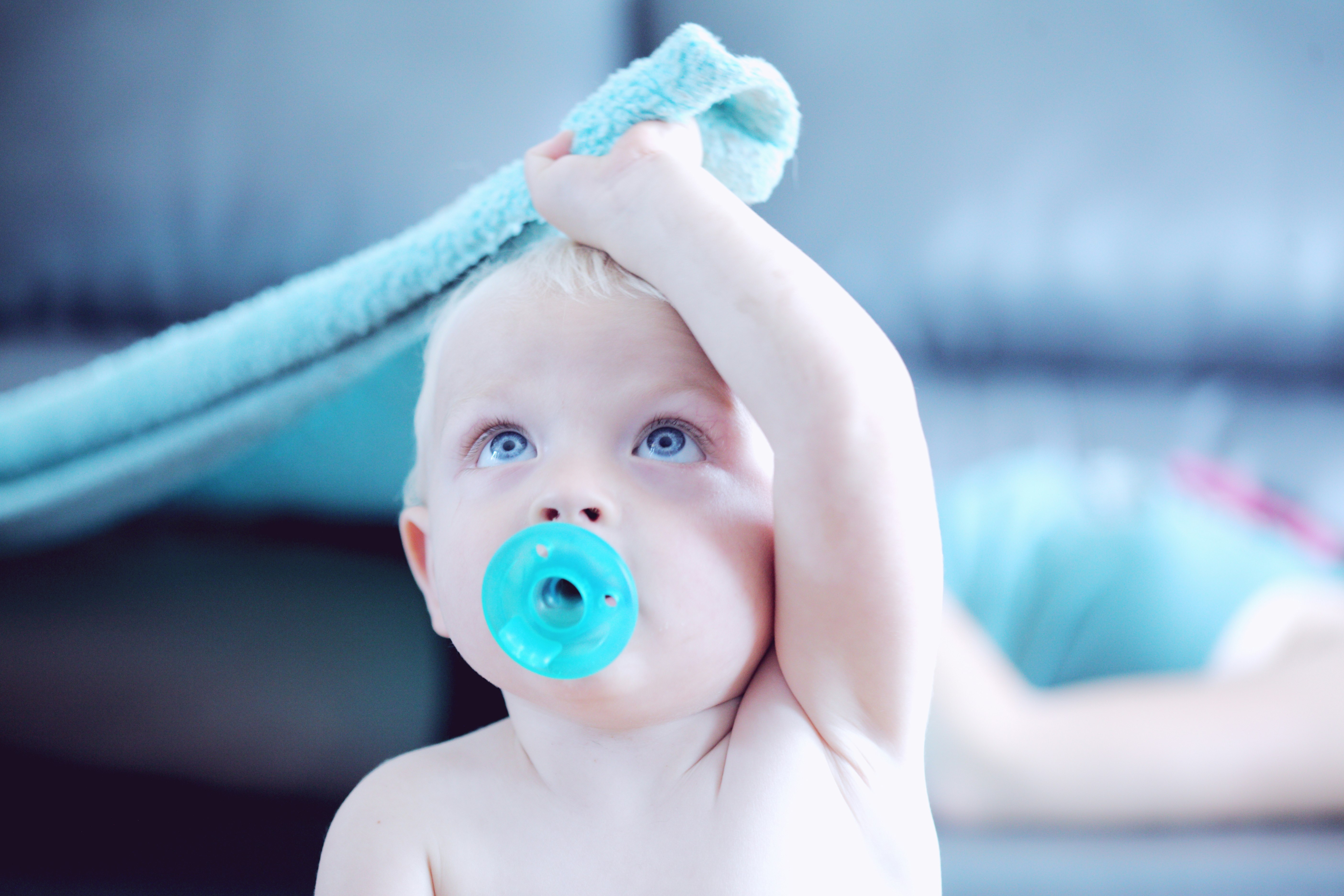 baby with pacifier in mouth